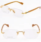 Gucci GG1221O Yellow Gold Classic Stripe Unisex Narrow Eyeglass 006 New. Price: $272.60.