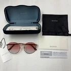 Gucci GG0206SK-004 Gold Orange Round Metal Unisex Pre-owned Authentic Designer. Price: $359.00.