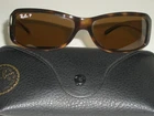 Ray Ban RB4078 642/57 Sleek Polarized Crystal Shiny Tortoise Sunglasses Pre-owned. Price: $239.99.